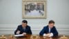 Министр энергетики Узбекистана Журабек Мирзамахмудов и глава «Газпрома» Алексей Миллер (архивное фото).