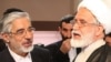 مهدی کروبی (راست) و میرحسین موسوی.