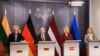 Прем’єр-міністерка Литви Інгріда Сімоніте, канцлер Німеччини Олаф Шольц, прем’єр-міністерка Латвії Евіка Сіліна та прем’єр-міністерка Естонії Кая Каллас виступають на спільній пресконференції під час зустрічі в Ризі, Латвія, 6 травня 2024 року