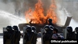 Armenia -- Riot police practice practice crowd dispersal at the Arzni airfield, 13Sep2014.