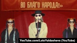 Lolaning senzurani «fosh qilgan» klipidan olingan kadr.