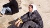 Journalist Safia Hasass covering a Kabul prison uprising in February