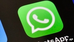 Значок мессенджера WhatsApp, иллюстративное фото 