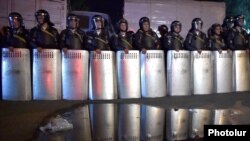 Armenia - Riot poice block a street in Yerevan leading to a police station seized by opposition gunmen, 24Jul2016.
