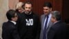 Пратеникот Павле Богоевски носи маица за поддршка на СЈО на конститутивната седница на парламентот