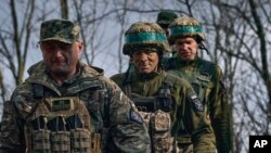 Ukrán katonák Bahmutnál 2023. március 27-én