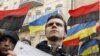 Представник молодіжного руху під час акції протесту біля Адміністрації Президента, 19 березня 2010 року