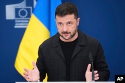 Volodimir Zelenski, duminică, pe 17 august, la o conferință de presă la Bruxelles, înainte de întâlnirea Coalition of the Willing.