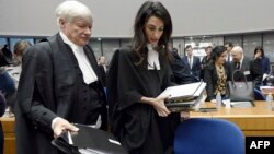 France -- Lawyers representing Armenia, Amal Clooney (R) and Geoffrey Robertson, arrive for the start of the appeal hearing in Perincek case before the European Court of Human Rights in Strasbourg, January 28, 2015 