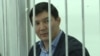 Бывший депутат парламента Кыргызстана Дамирбек Асылбек уулу на суде. Алматы, 2 ноября 2018 года.