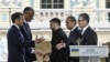 A file photo shows European leaders and Ukrainian President Volodymyr Zelenskyy shaking hands after a joint press conference in Kyiv on May 10, 2025.